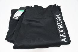 One as new Air Jordan black joggers size XL (CK2199-011. Some marks on the right leg).