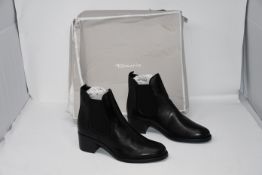 One as new Tamaris black ankle boots size 37 (Box damaged).