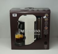 One boxed as new Nespresso Vertuo Plus GCB2 coffee machine in black.