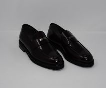 One as new Sergio Rossi Men's Black Loafer size 10.