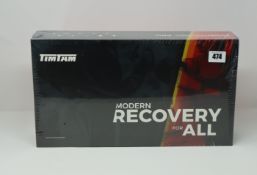 A boxed as new TimTam Modern Recovery for All Power Massager hand held device (Sealed).