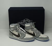 One pair of boxed as new Dior Air Jordan 1 High Sneakers in Wolf Grey/Sail-Photon Dust-White (US