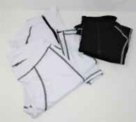 A large quantity of as new sports leggings and crop top sweaters Colour: black and white.