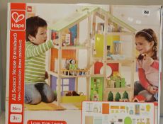 One boxed as new Hape E3401 All Season House.