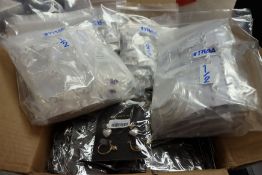 A quantity of assorted costume jewellery to include earrings and bracelets.