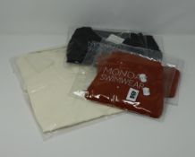 An as new Monday Riviera Bikini in clay crinkle (S bottoms M top) and a Mondays Riviera black Bikini