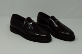 One pair of man's boxed as new Sergio Rossi loafers in Bordeux (EU 6).