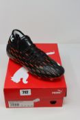 One boxed as new Puma Future 6.1 Netfit FG/GA. Black-white shocking orange. Size UK 7.5 (106179