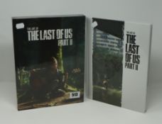Two Art of The Last of Us Part II hard cover books from Dark Horse (One Deluxe Edition).