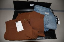 A pair of as new Uterque trousers (M). A pair of as new Nine In The Morning jeans (Size TG28?).