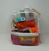 An as new clear plastic backpack containing a quantity of Morphe beauty products to include icy lips