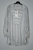 An as new Co Los Angeles blue striped pop over shirt spring-summer 2020 (UK S).