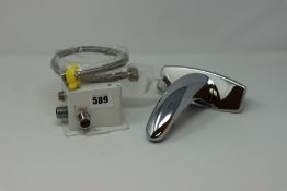 Five Automatic Sanitary Wares bathroom taps and related items.