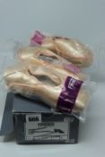 Two pairs of Freed of London pointe shoes size 5. One pair of Freed of London pointe shoes size 7.