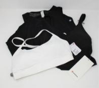 One as new Lululemon Flow Y Bra Nulu size 6 (white. security tag attached). One as new Lululemon