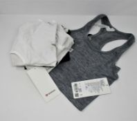 One as new white Swifty Tech Racerback 2.0 size 6 (some marks on the front. Security tag