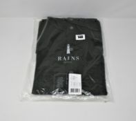 One as new Rains green long jacket size XS/S.