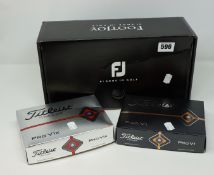 A quantity of golf related items to include FootJoy superlight men's golf shoes (Size: 8.5 UK).
