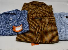 Two men's as new Ben Sherman Short Sleeve Gingham shirt size L. One men's as new Ben Sherman navy