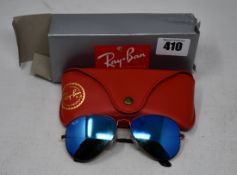 A pair of as new Ray Ban sunglasses.