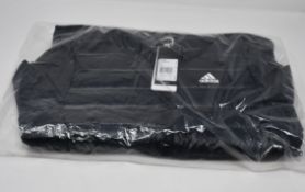 One women's as new Adidas Varilite Down black jacket size XS (BQ1968).