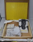 An Eleven By Venus On-The Defense sunscreen (50ml), Unrivalled sun serum (30ml) and a white Eleven