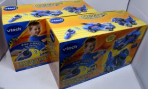 Four boxed as new Vtech Switch & Go Dinos - Dash the T-Rex.