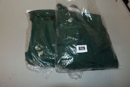 Two as new GodDiva Bardot pleated occasion in emerald green dresses (1 x UK 10 and 1 x UK 12).