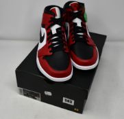 One as new Air Jordan 1 Mid Chicago Toe size UK 10.5 (554724-069).