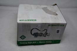 One boxed Schaeffler timing belt and water pump.