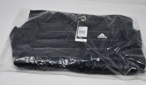 One women's as new Adidas Varilite Down black jacket size XS (BQ1968).