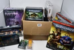 A large quantity of Warhammer war game figures and related items to include Warhammer 40,000 recruit