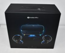 One boxed as new Oculus Rift S headset and controllers (VR headset, two touch controllers, 5m