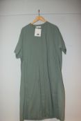 One as new Olive Takuya V Neck Dress one size. Colour: mint.