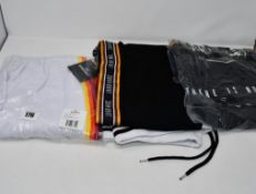 One as new Birdiebee White Phoenix pant size XL. One as new Jahr Marc Shoulder Taped Black
