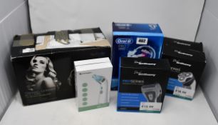 Thwo as new Paul Anthony Pro Series 3 shavers, Paul Anthony Pro Series 2 shaver, an Oral-B Pro 2