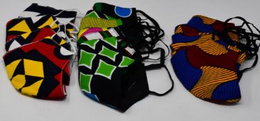 A large quantity of as new colourful face masks.