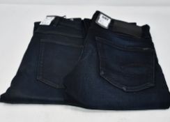One as new G Raw slim jeans (Colour: dark aged. Size 30/30. Model: 3301. Security tag attached). One