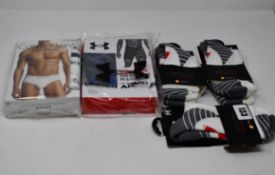 One men's as new Under Armour UA Tech 6 inch Boxerjock size M (pack of 2). One as new Calvin Klein