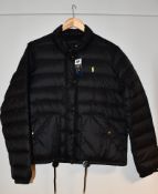 One women's as new Ralph Lauren black down jacket size XL (211750267005. Small damage underneath the