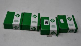 Four boxes of INA Track Roller bearings.