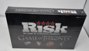Six boxed as new Risk board game Game of Thrones deluxe edition.