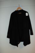 An as new Beige black two piece long sleeved cardigan and short sleeved under t-shirt top (Size 18