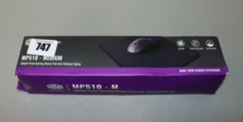 A boxed as new Cooler Master MP510-M Mouse pad with stitched edge.