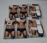 Two as new Sloggi basic midi white cotton brief size XL (pack of two). Four as new Sloggi basic midi