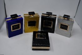 Two as new Hearty Trendy Perfume Bottle shoulder strap Paris Label black purse. One as new Hearty