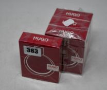 Four boxed as new Hugo Boss Woman eau de parfum (50ml).