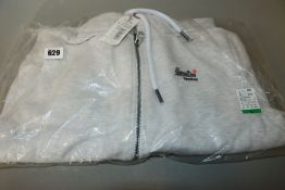 One as new New Balance grey pack pant size S (some marks on the front and back). One as new Superdry