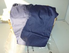 A large quantity of unisex navy scrub bottoms size XL.