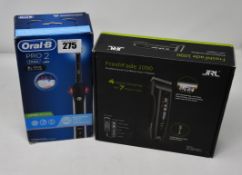 One JRL Professional FreshFade 1090 professional cordless hair clipper and one Oral-B Pro 2 2000 (